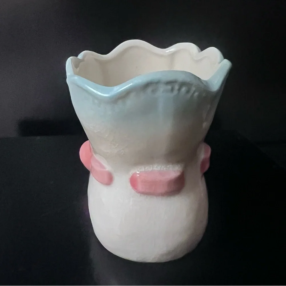 Vintage ceramic baby bootie vase